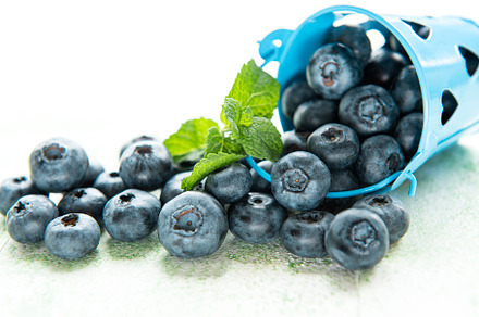 Blueberries on wooden background, a Food & Drink Photo by Olena Rudo