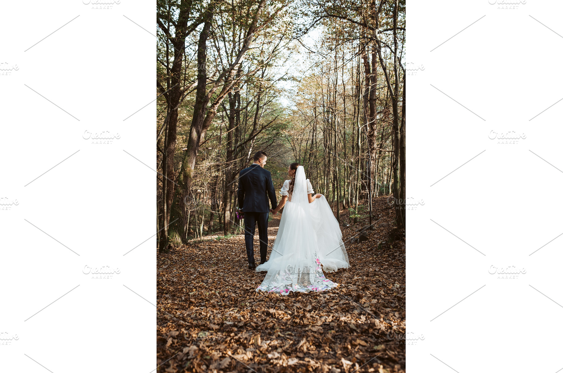 Rear view of bride and an groom in, a Person Photo by HalfPoint