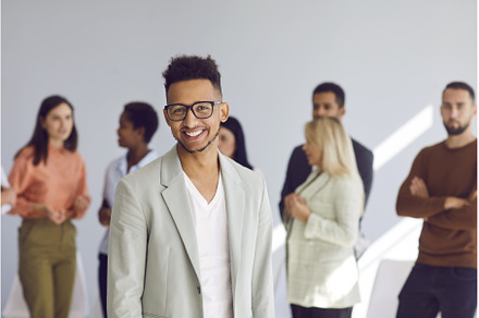 Portrait of positive male employee, a Person Photo by StudioRomantic