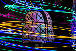 A bright multicolored backpack on a, a Background Photo by Stockphoto by vzwer