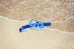 Snorkel mask on the beach, a Sports & Recreation Photo by BOOCYS