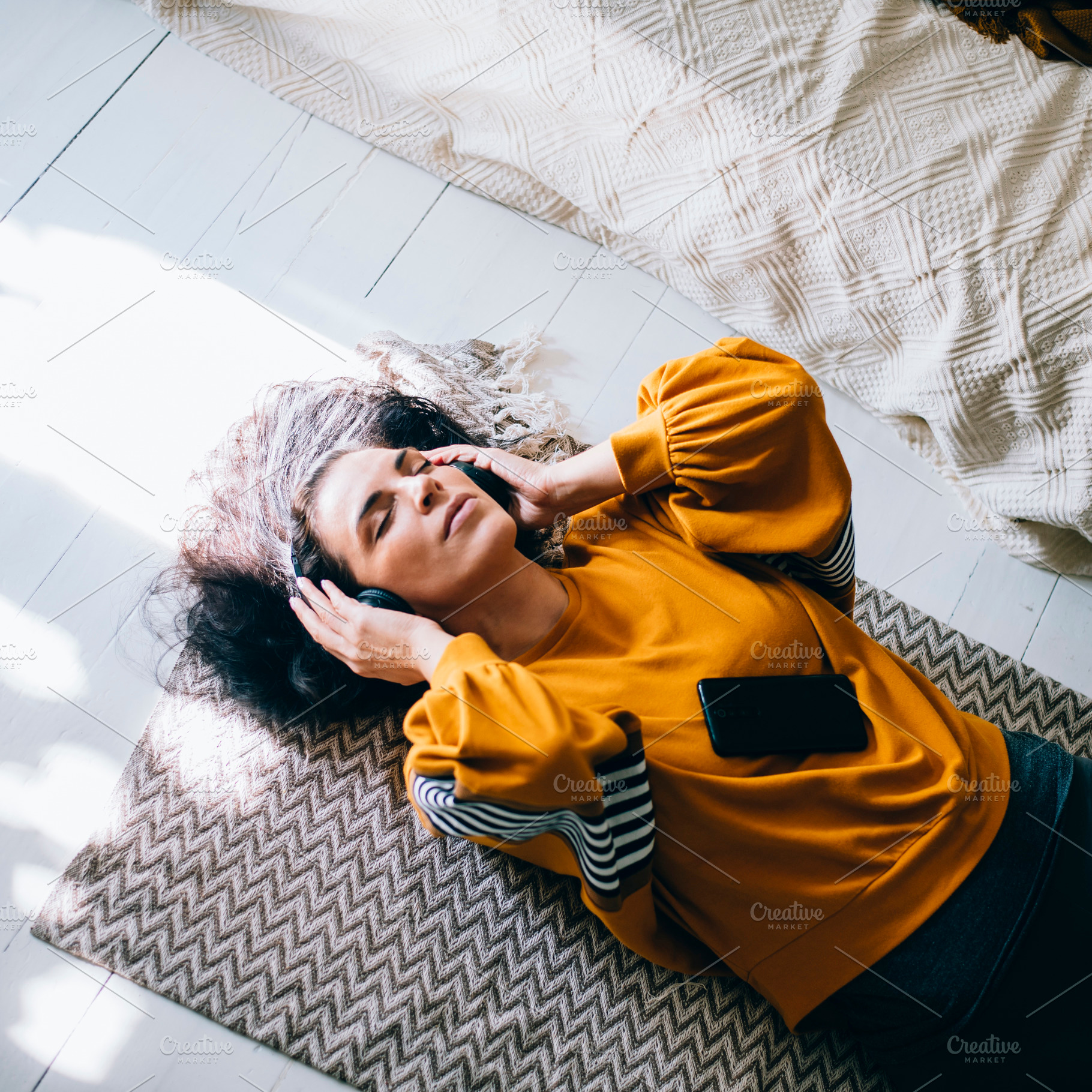 Woman 40s relaxing and listen music, a Person Photo by hitdelight