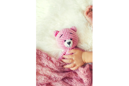 A newborn baby sleeps with a teddy, a Person Photo by yanadjana