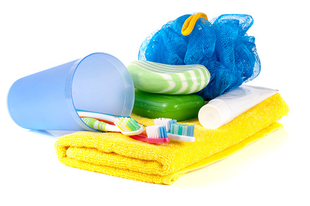 Hygiene products soap toothbrush and paste loofah towel isolated on white, a Beauty & Fashion Photo by NataPhoto