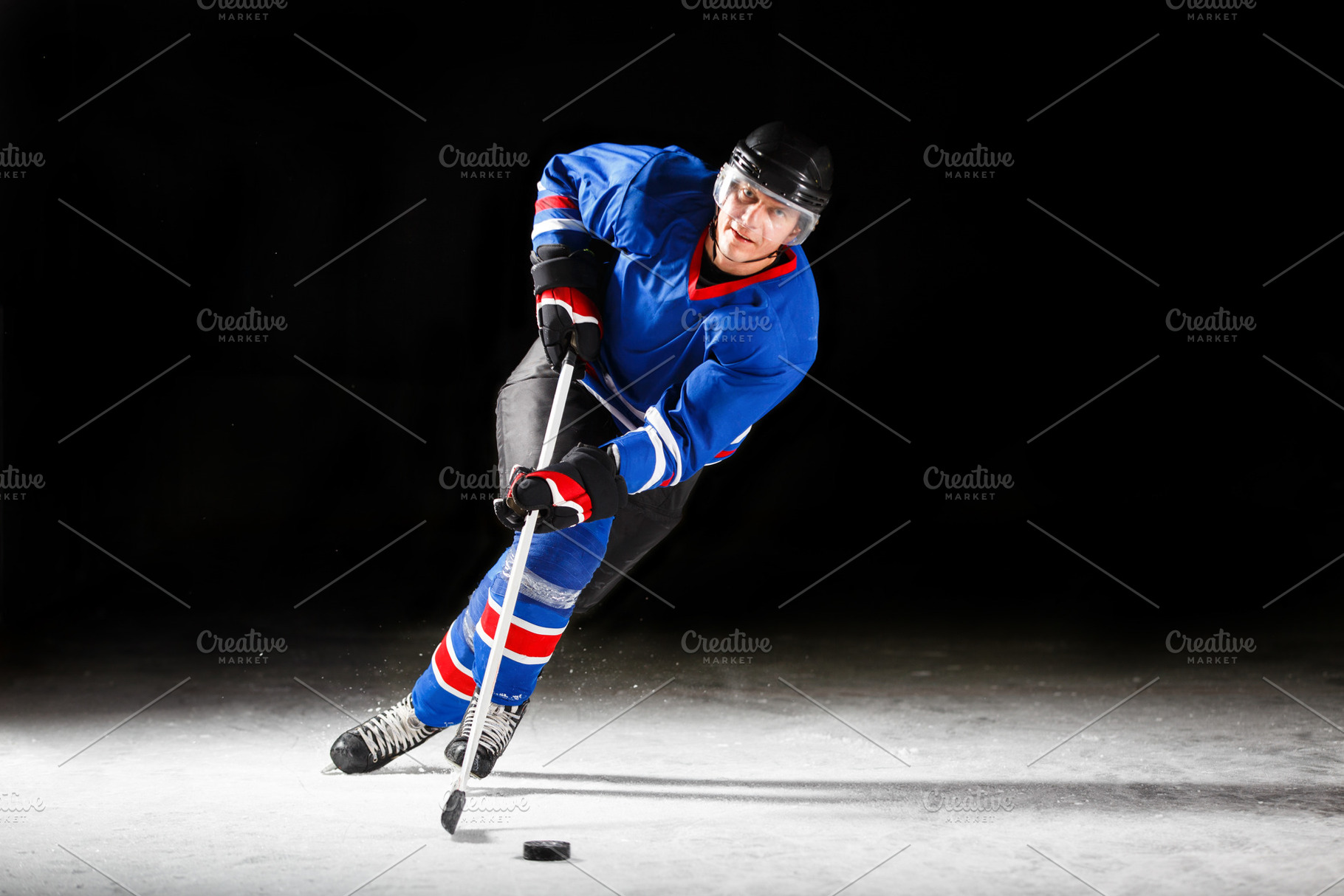 Young hockey player skating on rink containing ice hockey, alone, and hockey, a Sports & Recreation Photo by serkum