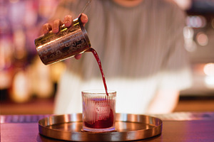 Serving drink preparing liquor bartender beverage, a Food & Drink Photo by Photo Drive Studio