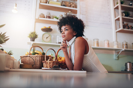 African female juice bar owner, a Food & Drink Photo by Jacob Lund