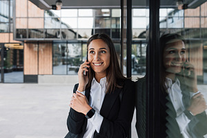 Smiling female in black formal wear, a Business Photo by Artem Varnitsin