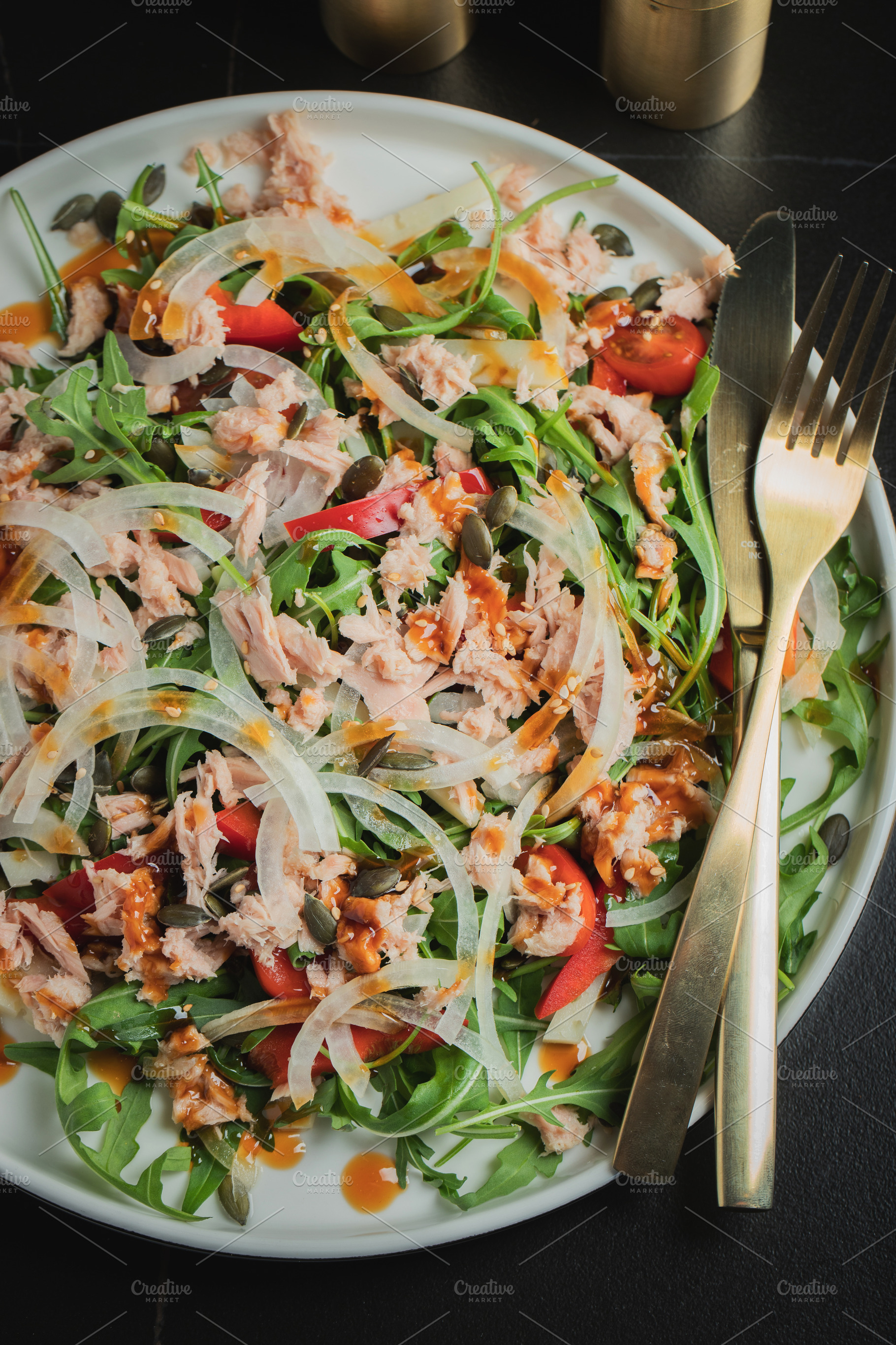 Fresh Tuna Salad with Onions and Cherry Tomatoes. Italian Mediterranean Cuisine, a Food & Drink Photo by Budarinphoto