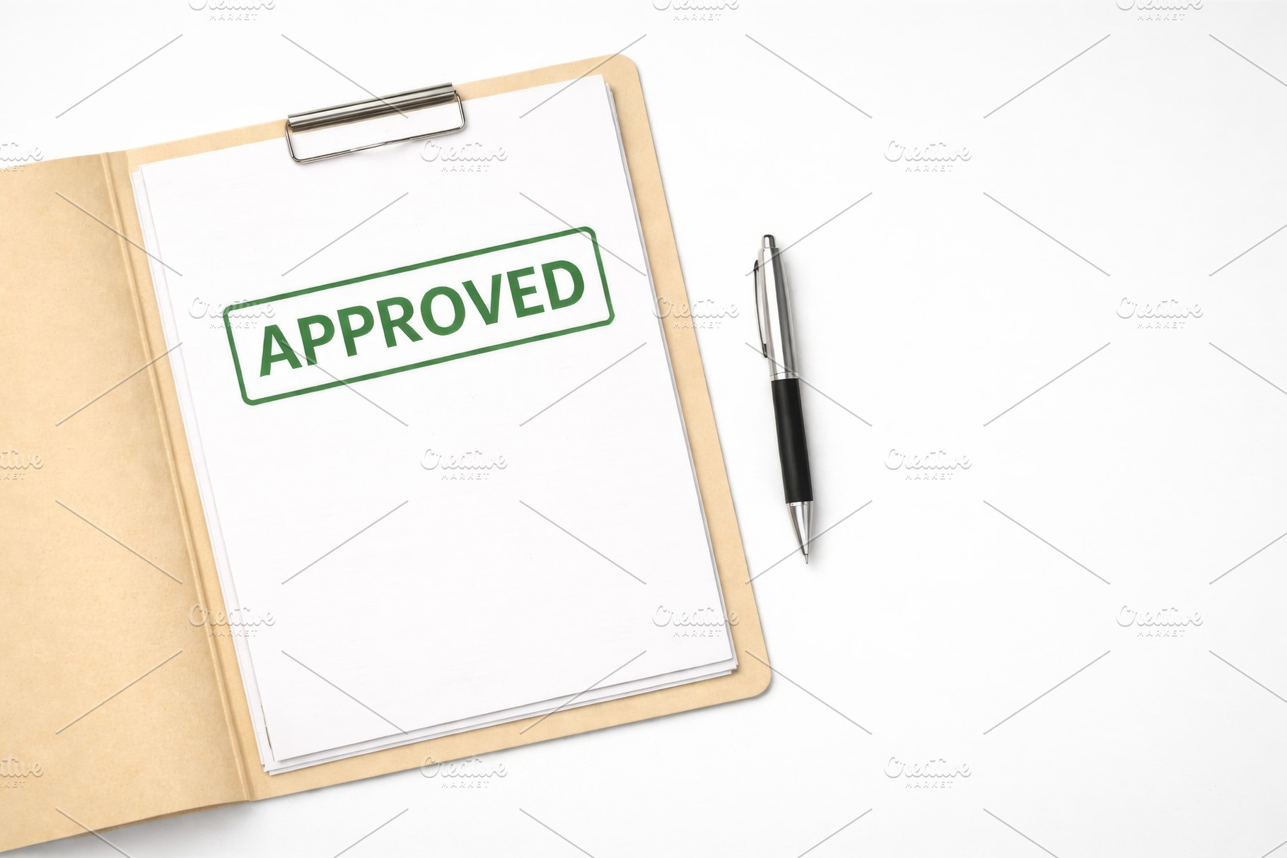 Approved document with clipboard and, a Photo by Dvoevnore photos