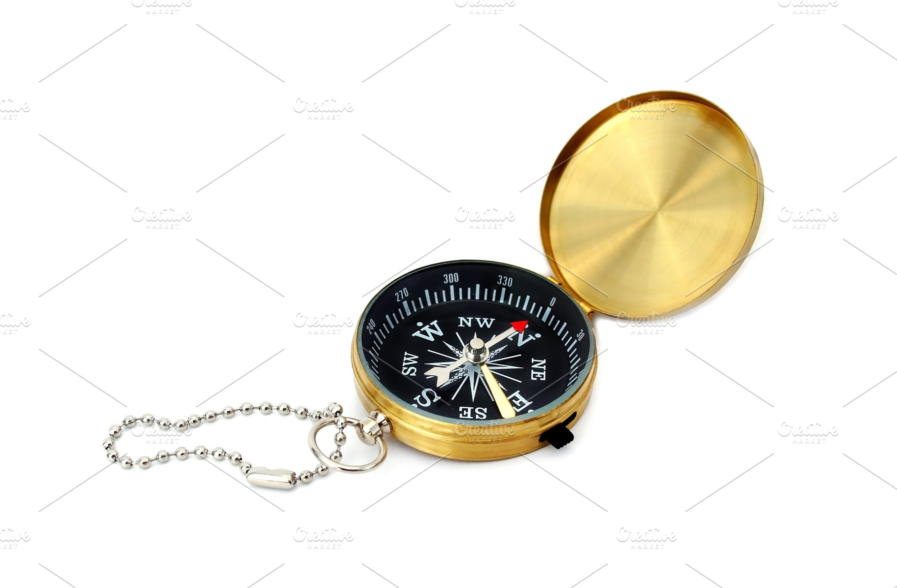 Golden compass isolated, a Photo by saiko3p