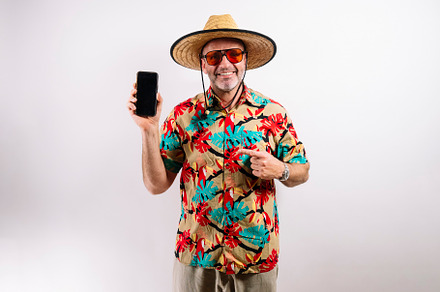Mature tourist holding phone with blank screen