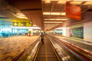 Airport containing airport, gate, and escalator