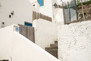 From below of white houses and steps in small town of Portugal, a Photo by andreonegin market