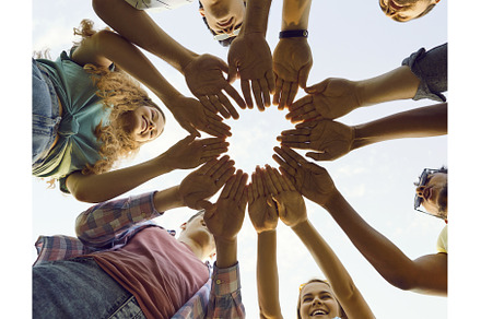 Multiracial team of happy young, a Person Photo by StudioRomantic