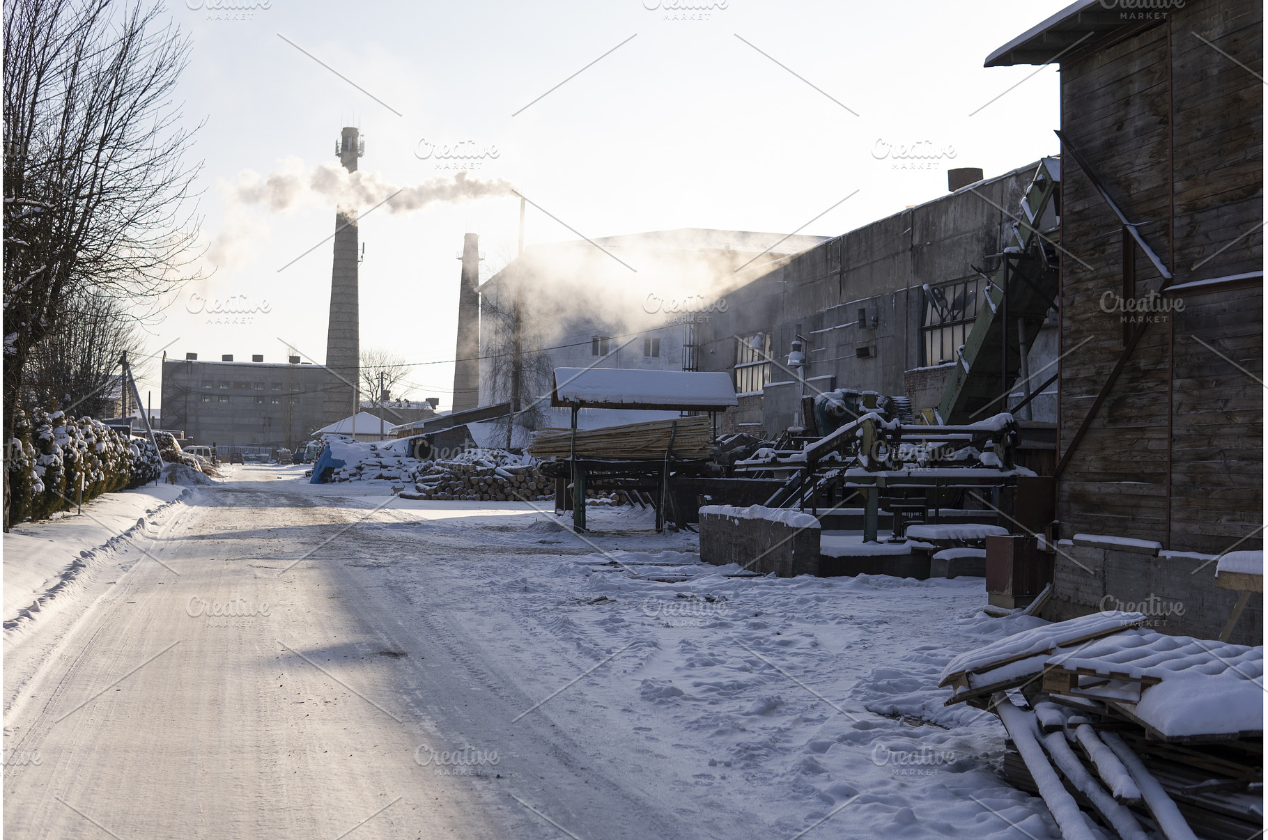 Snow-covered industrial factory, an Industrial Photo by volodymyrshtun13795