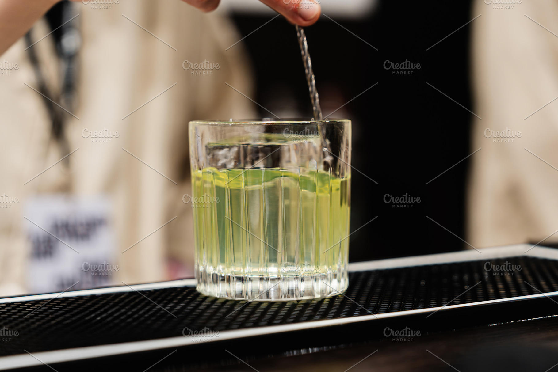 Preparation of a delicious cocktail based on gin and vodka., a Food & Drink Photo by Rov.7