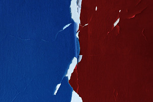 Torn blue and red wall surfaces reveal a white divide, geopoliti, a Photo by salmon.black