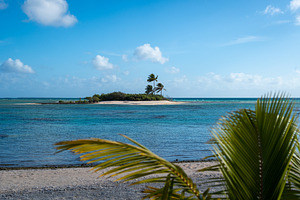 Idyllic motu view from a beach in Tikehau, French Polynesia, a Photo by GoodGoods