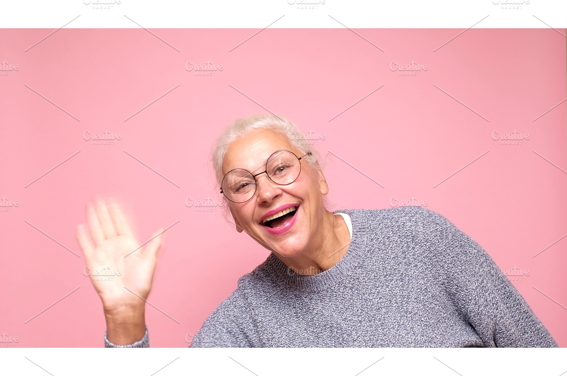 an elderly European woman greeting a, a Person Photo by Koldunova