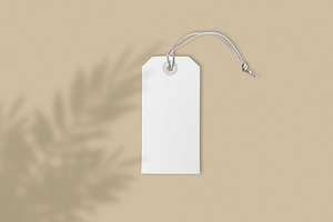 Price label tag on brown background, a Business Photo by BOOCYS