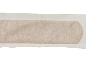 Brown medical plaster in a sealed paper protective package on an, a Health & Medical Photo by ndanko