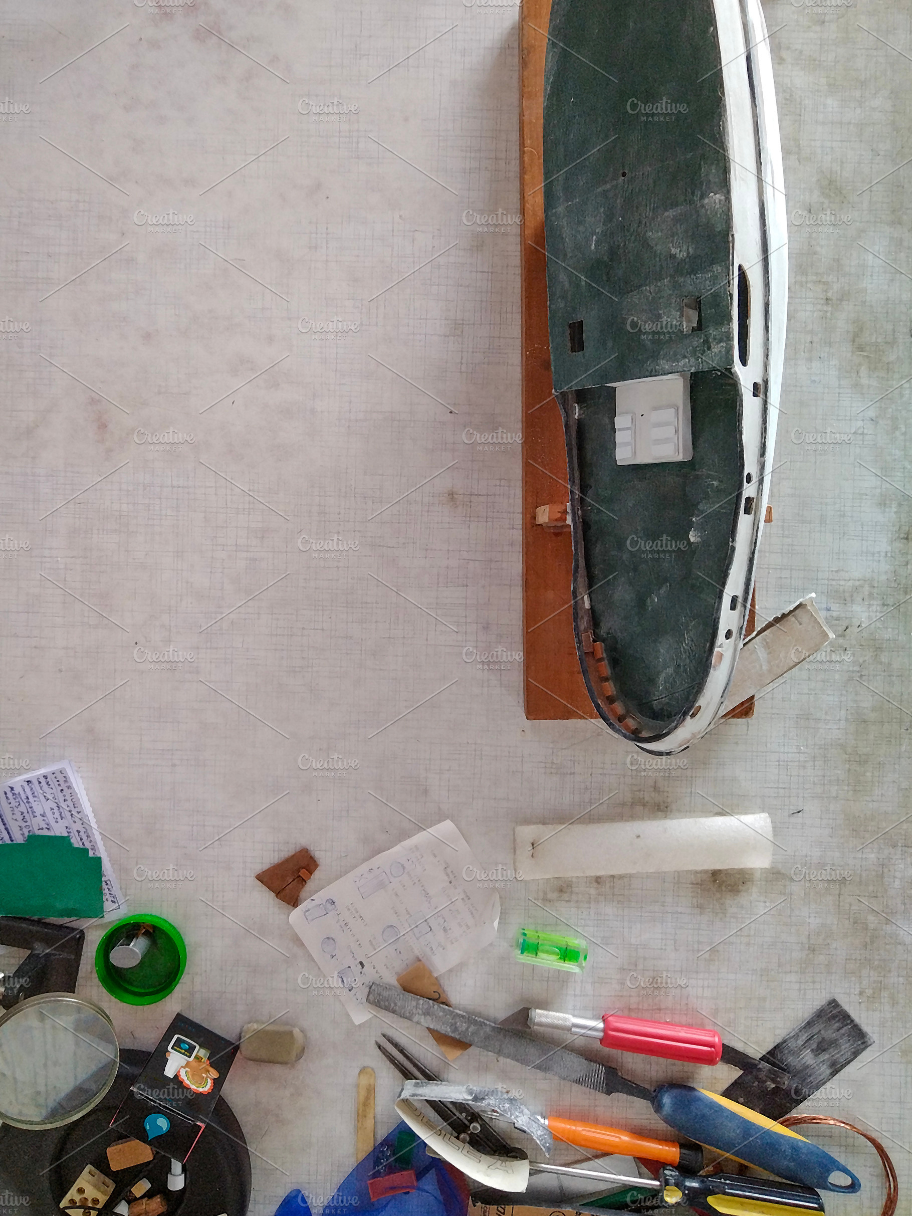 Handcrafted wooden model of a sailboat under construction., an Arts & Entertainment Photo by DanFLCreativo