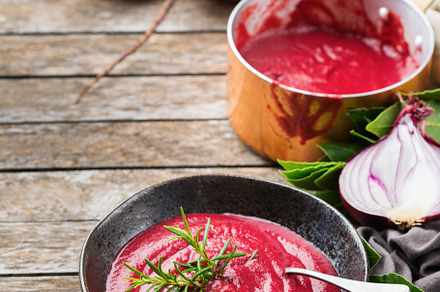 Seasonal fall autumn creamy beetroot soup on a table, a Food & Drink Photo by Antonina Vlasova