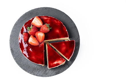 Cheesecake with strawberries isolated on white background, a Food & Drink Photo by etorres69