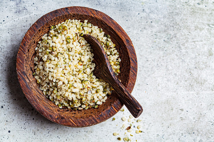 Peeled hemp seeds in a wooden bowl stock photo containing antioxidant and, a Food & Drink Photo by vaaseenaa
