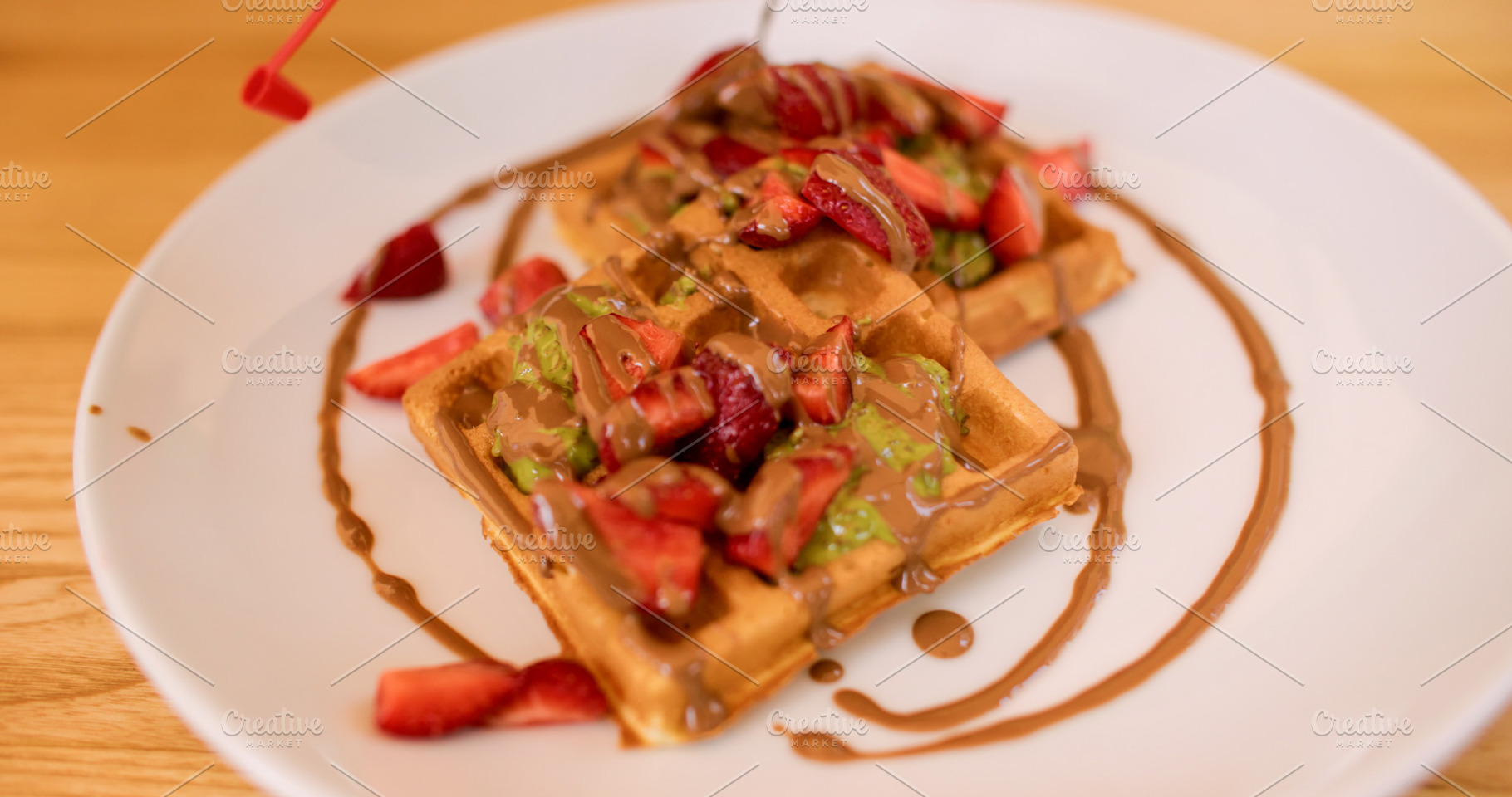 Waffles serving strawberry dessert pastry sauce, a Food & Drink Photo by Photo Drive Studio
