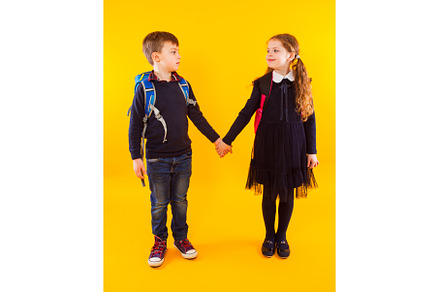 The little couple of schoolkids are, a Person Photo by oksix