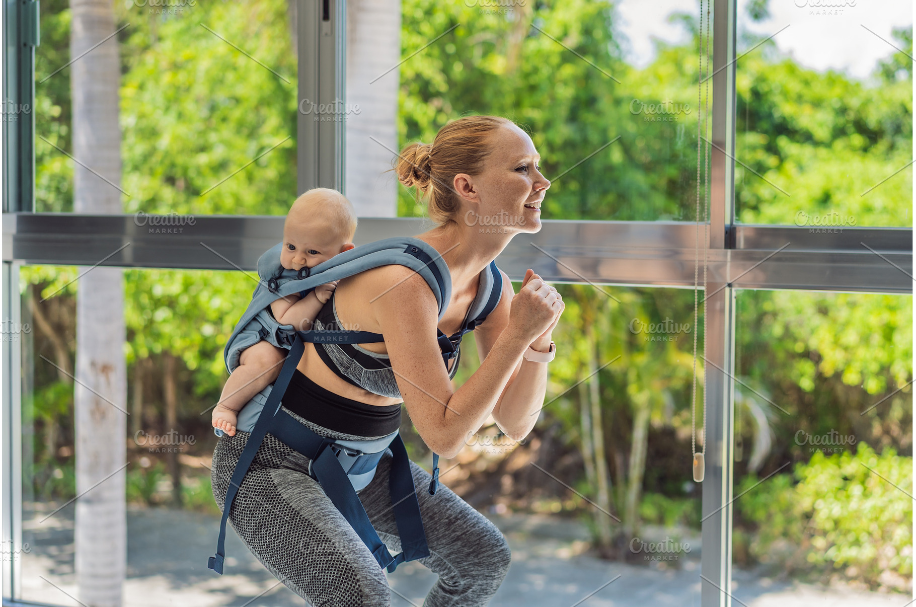 Mother doing fitness exercises while, a Sports & Recreation Photo by Elizaveta Galitskaya