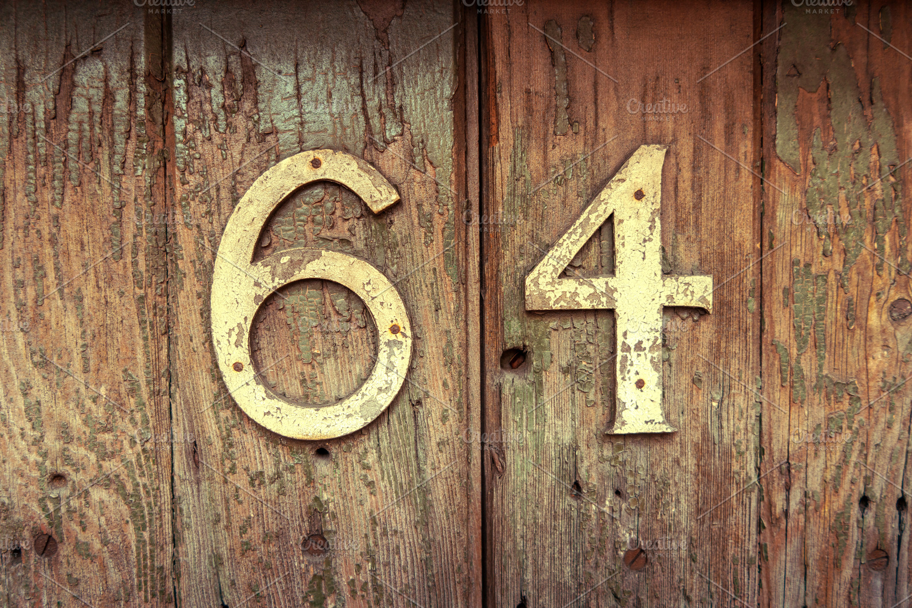 Weathered house number 64 on an old wooden surface, a Background Photo by GoodGoods