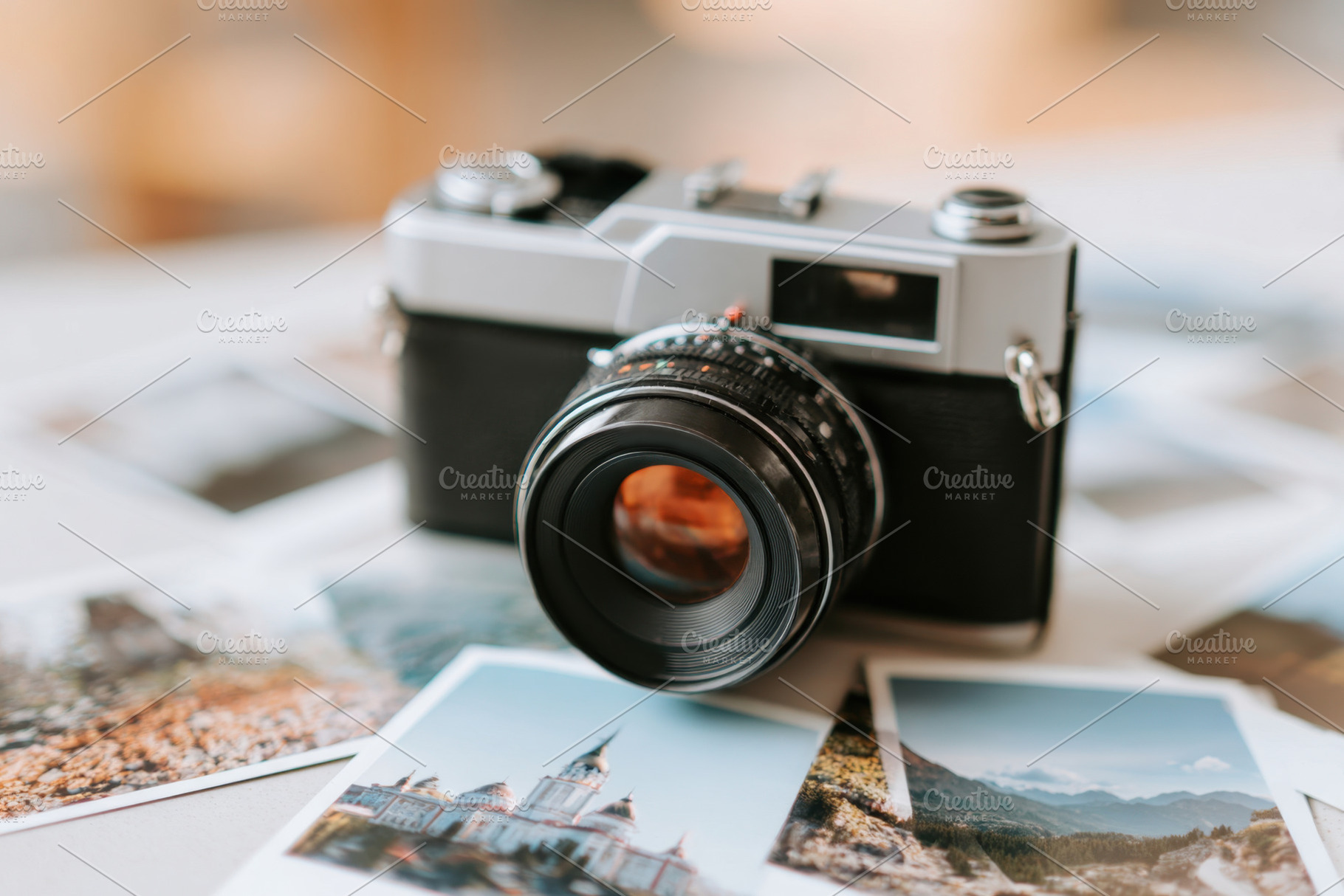 Vintage camera with printed photographs, a Technology Photo by AlyaAnd