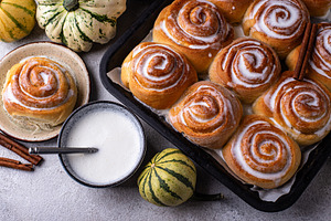Cinnamon rolls with cream cheese, a Food & Drink Photo by Yulia Furman
