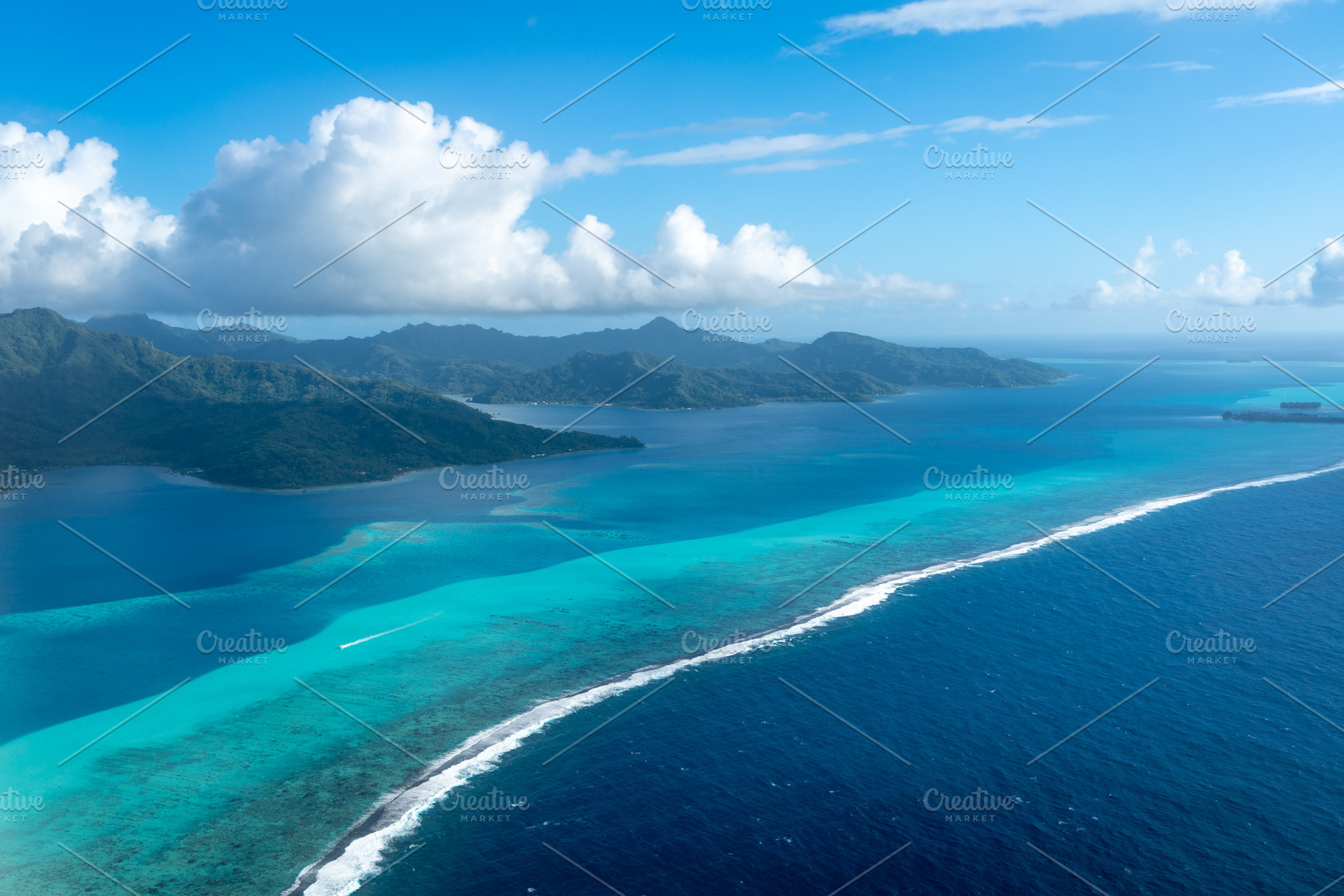 Aerial view of Tahaa island, French Polynesia, with turquoise la, a Nature Photo by GoodGoods