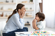 Professional woman specialist training with cute little boy, showing him oral e, a Photo by Prostock-Studio (Thumbnail 1 of 2)
