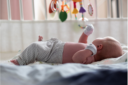 View on little baby girl in bed, a Person Photo by Koldunova