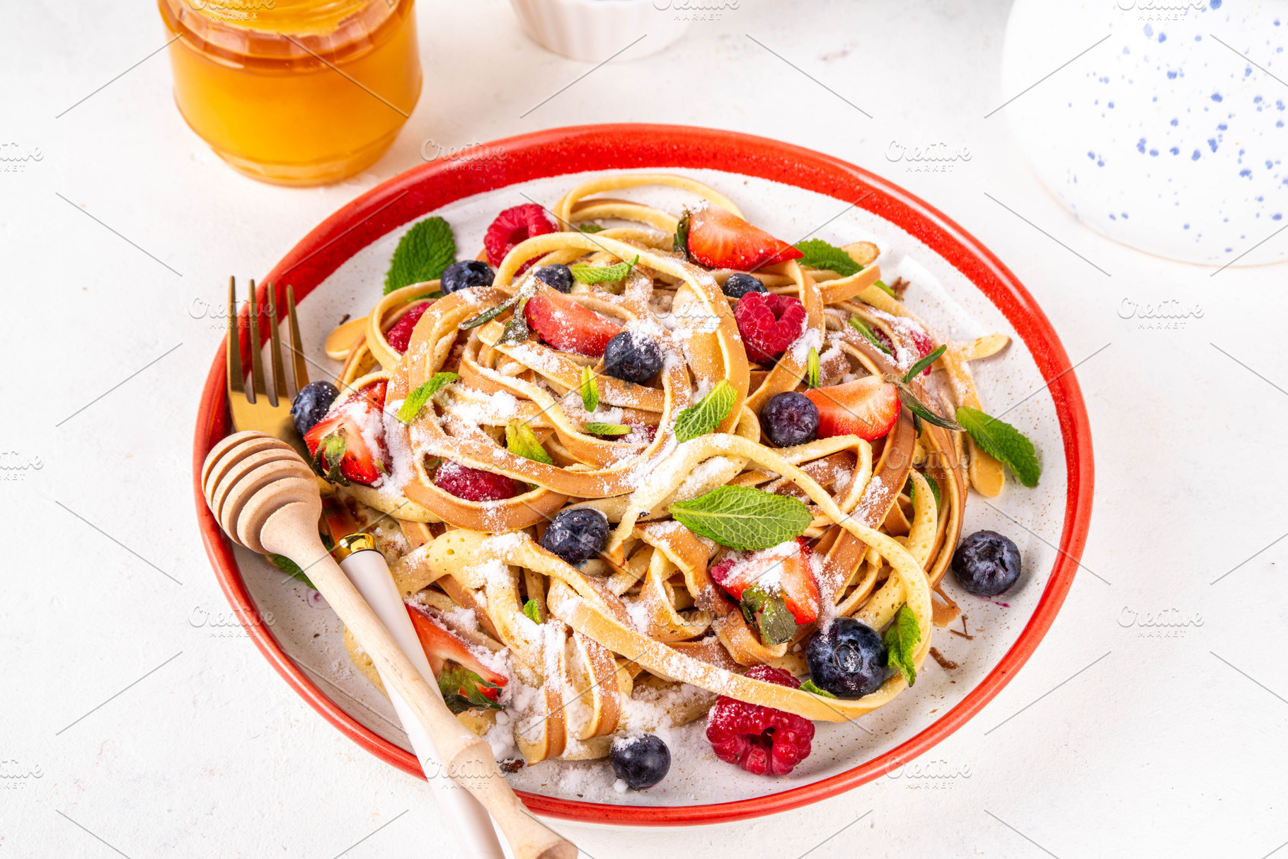 Viral trendy spaghetti pancakes with fresh berries, a Food & Drink Photo by Rimma
