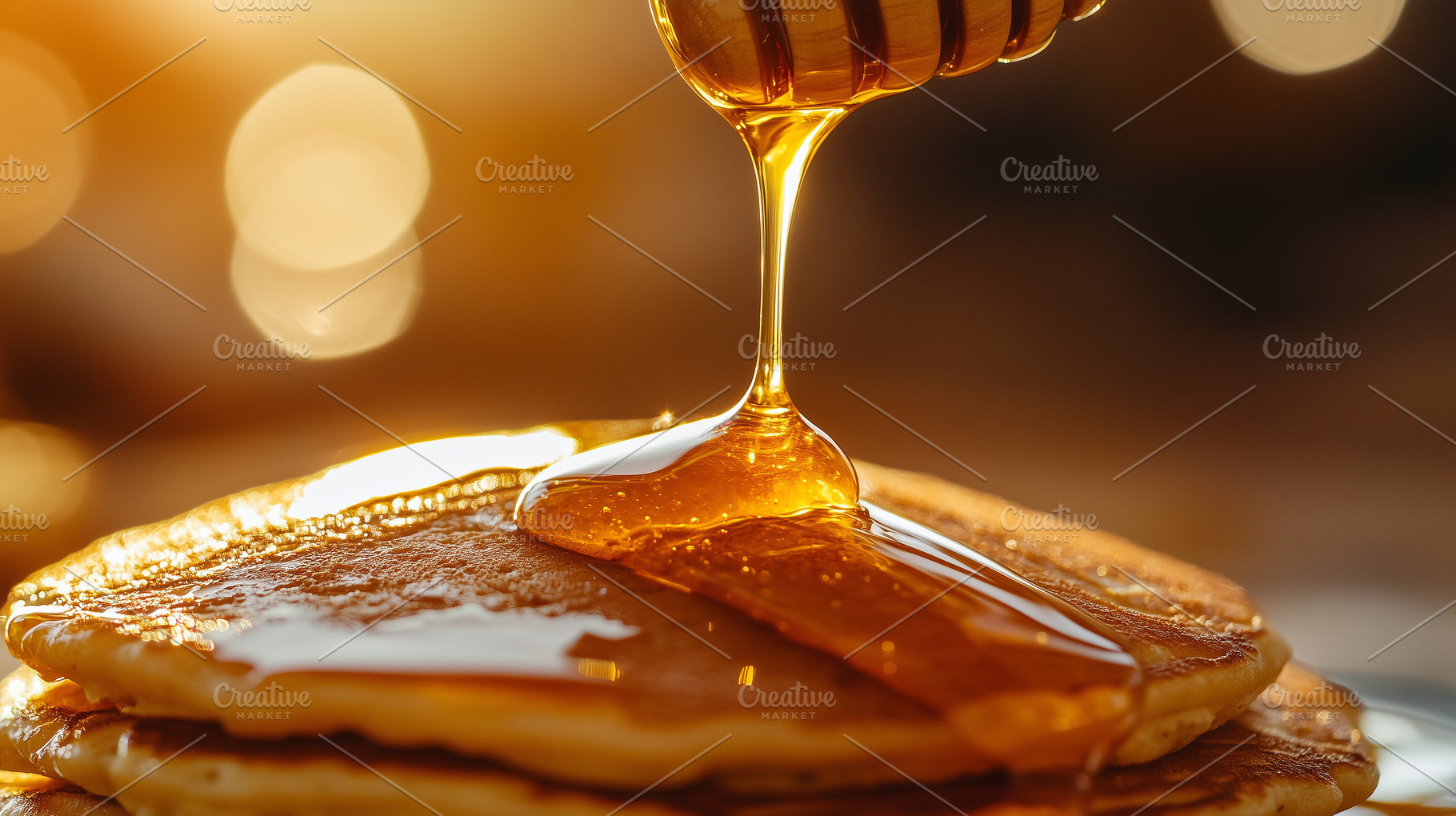 Dripping honey over pancakes, a Food & Drink Photo by MistyDay