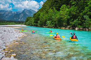 Kayakers exercising on the river, a Sports & Recreation Photo by Alpine Dreams