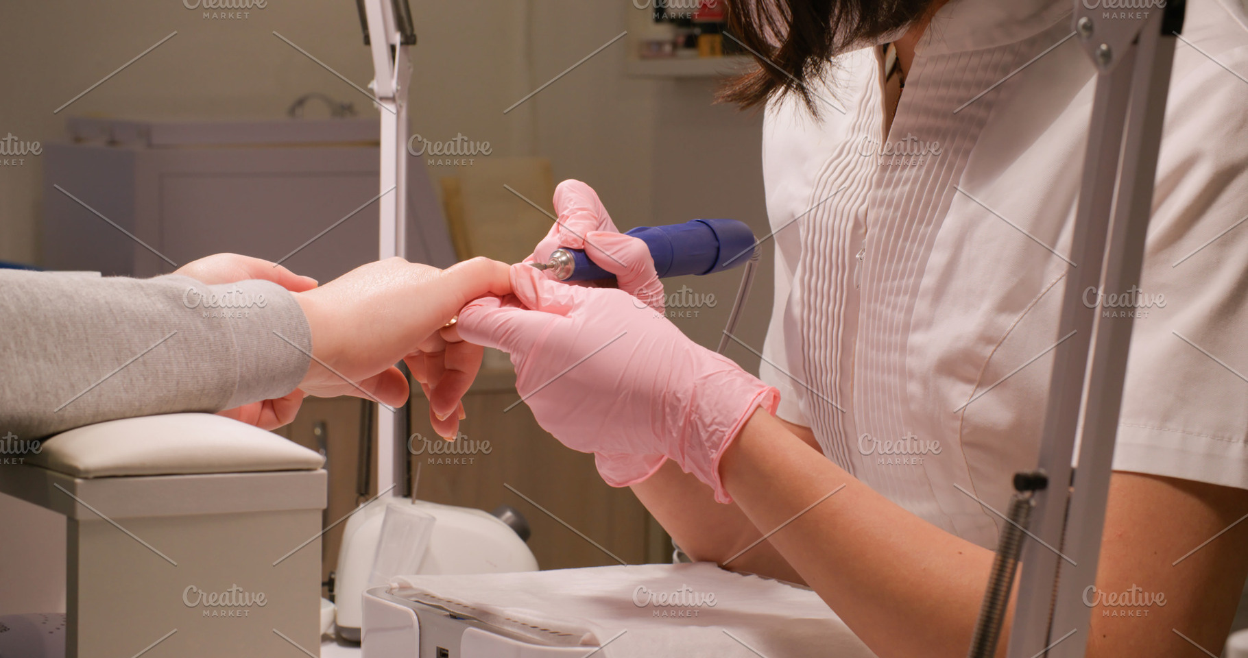 Nail manicure salon procedure woman hand treatment, a Person Photo by Photo Drive Studio