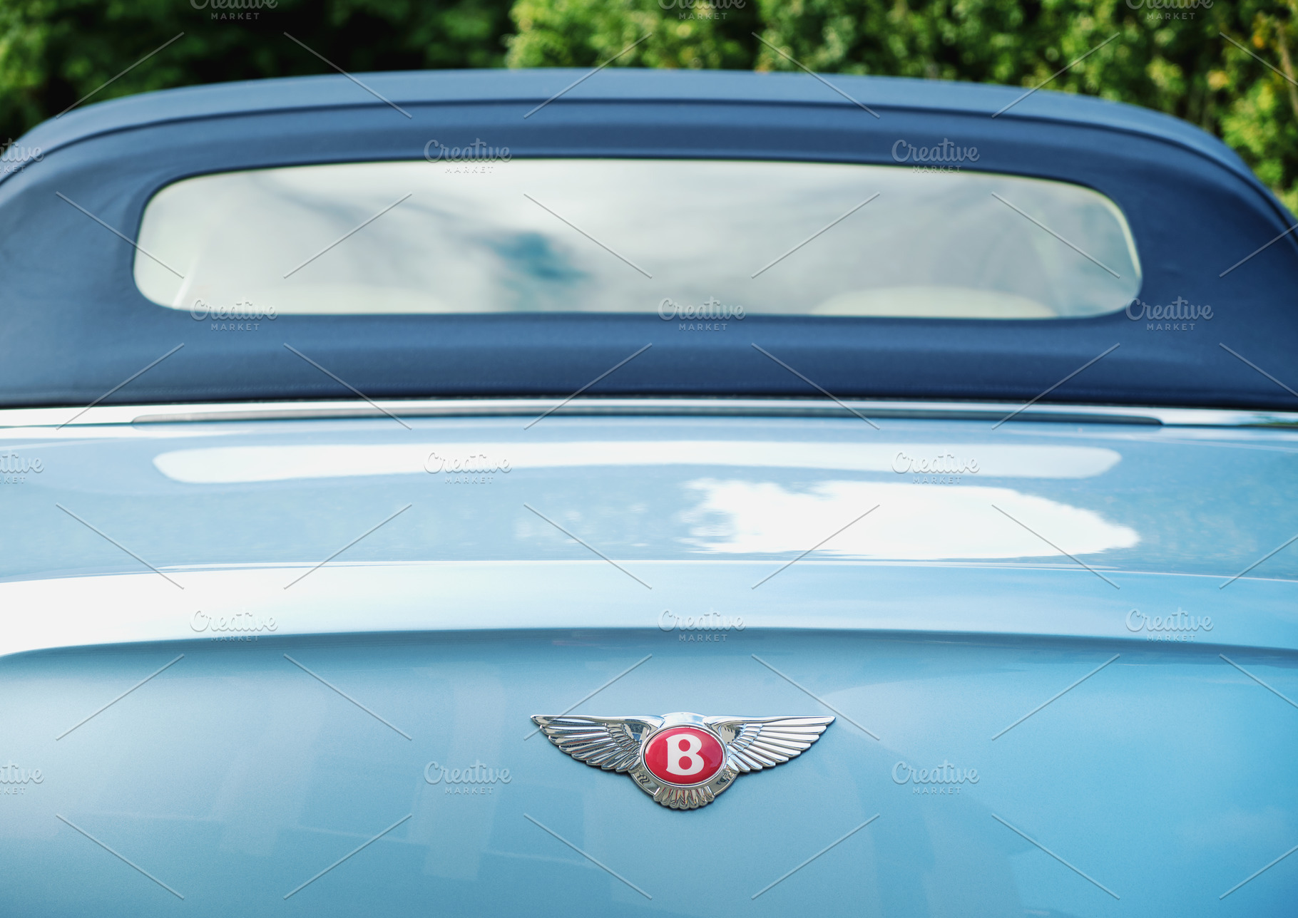 Bentley luxury car logo emblem, a Transportation Photo by BOOCYS
