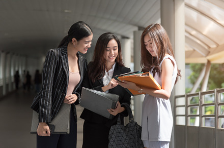 Business women looking and consulting at the report, Business co, a Business Photo by Ministocker