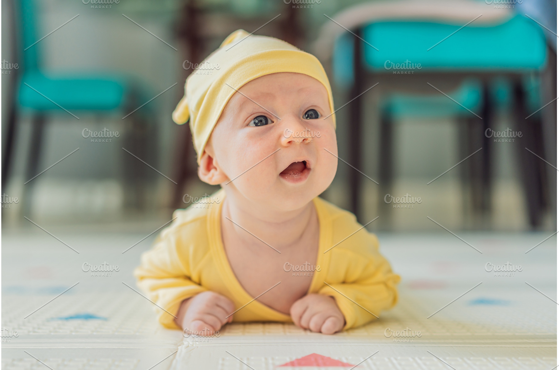 One-month-old baby lying on tummy, a Food & Drink Photo by Elizaveta Galitskaya