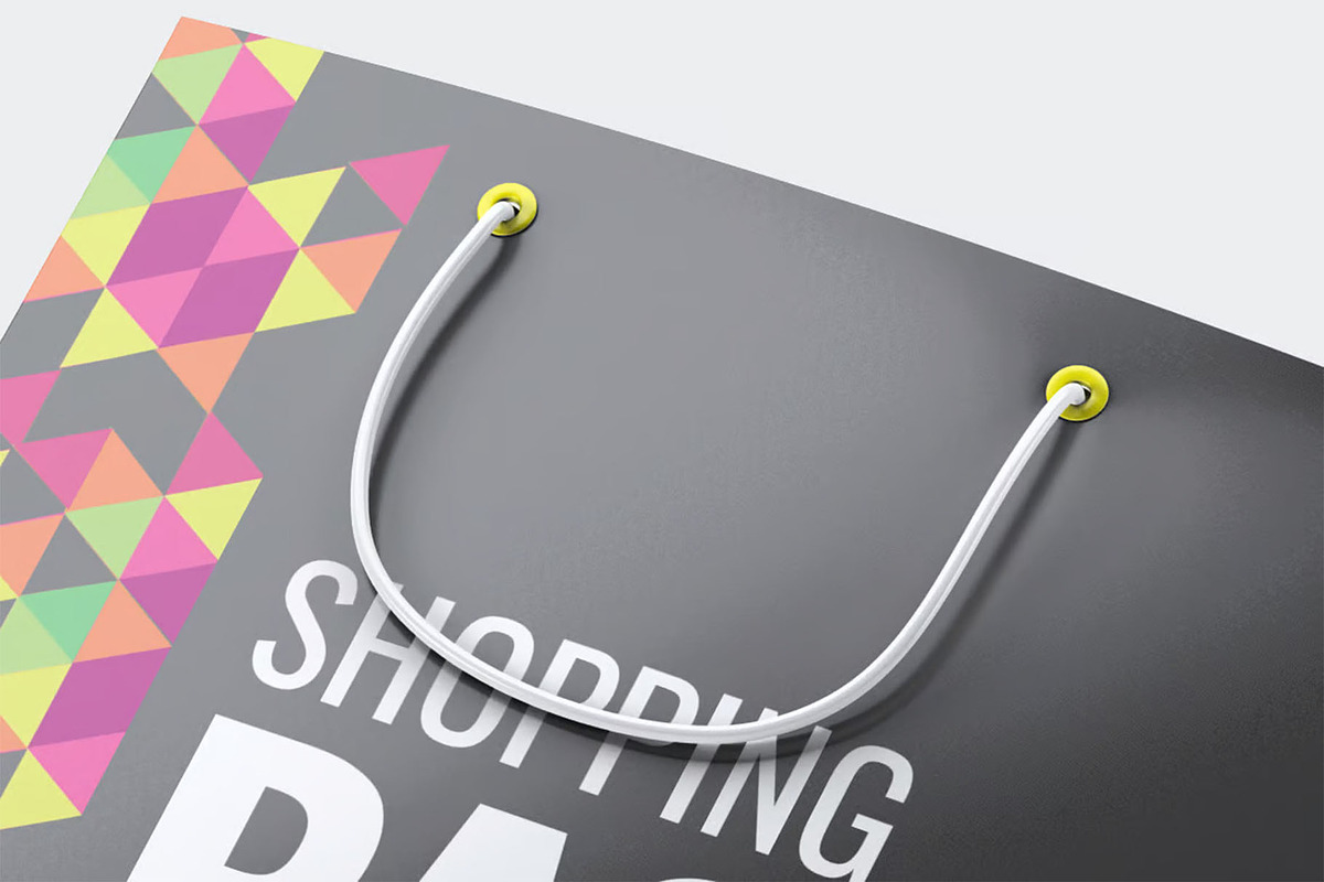 Paper Shopping Bag Mock-Up, a Packaging Mockup by DesignRushMarket (Photo 3 of 7)
