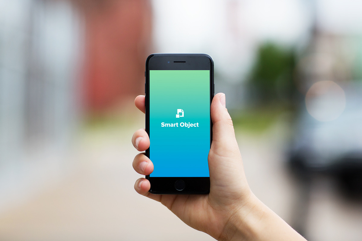 iPhone 7 Real World Mockup - City, an iPhone Mockup by Prixel Creative