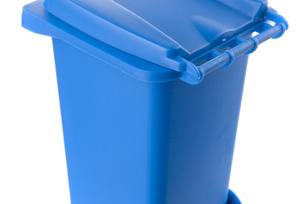 Plastic blue trash can isolated on white background