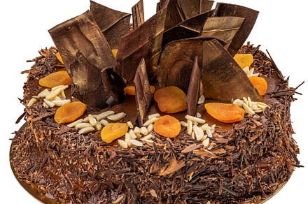 Chocolate cake decorated with dried apricot, a Background Photo by Grafvision photography